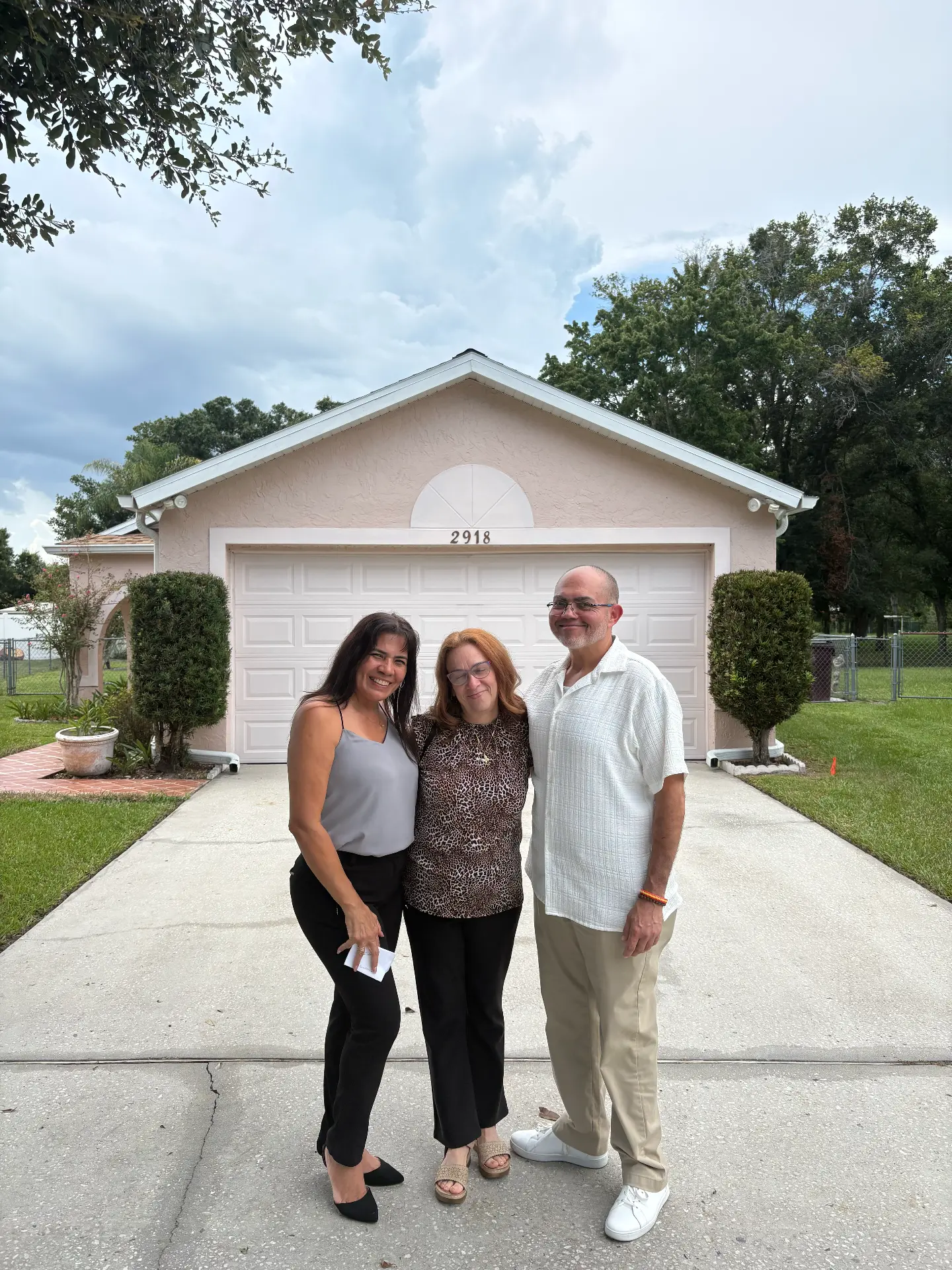 Amy with happy home buyers after their closing